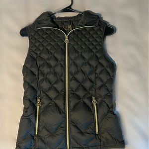 Olive green Michael Kors down vest with hood. In excellent shape.
